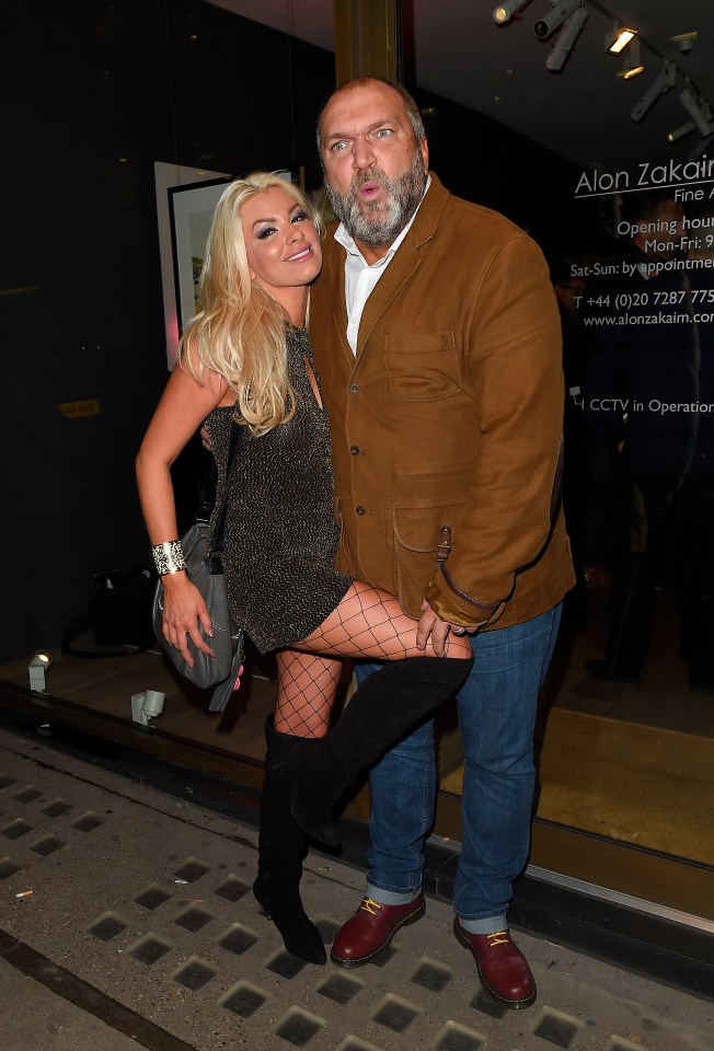  Leah Newman straddles hubby Neil Ruddock on a night out