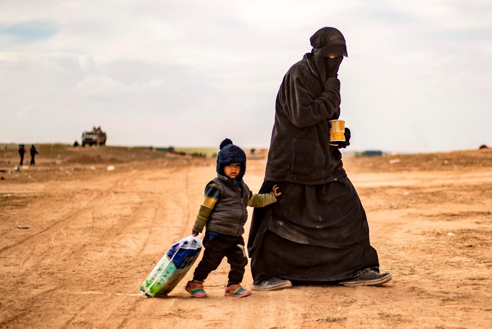 A woman pictured after leaving Baghouz