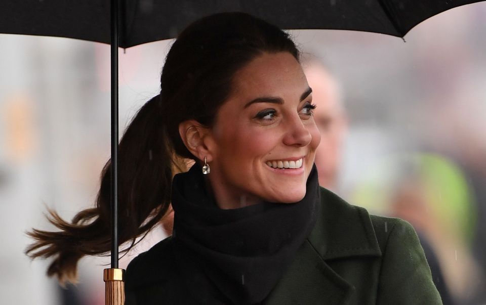 Kate beamed despite the soggy conditions