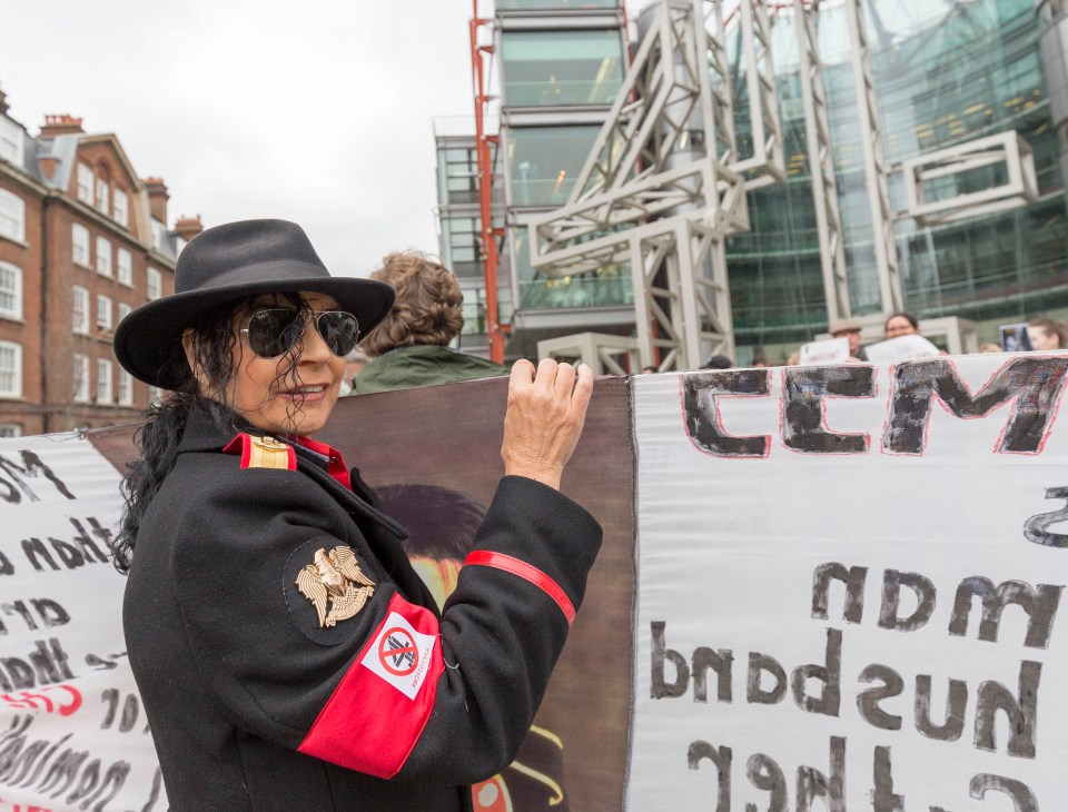  A fan of Jackson dressed as the late singer expressing anger about the documentary