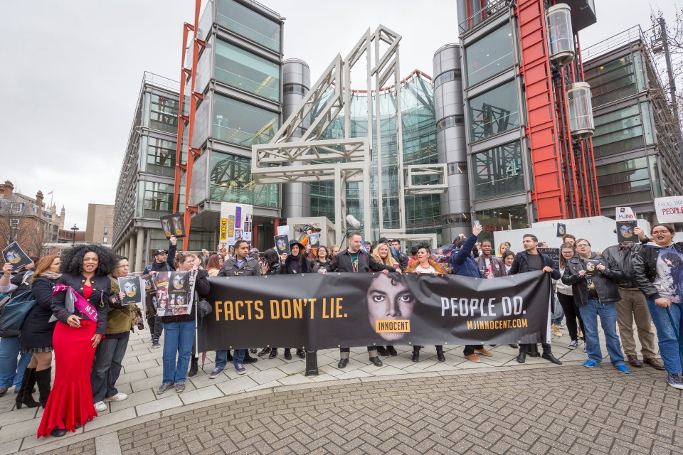  Protesters outside Channel 4 holding banner proclaiming Michael Jackson's innocence