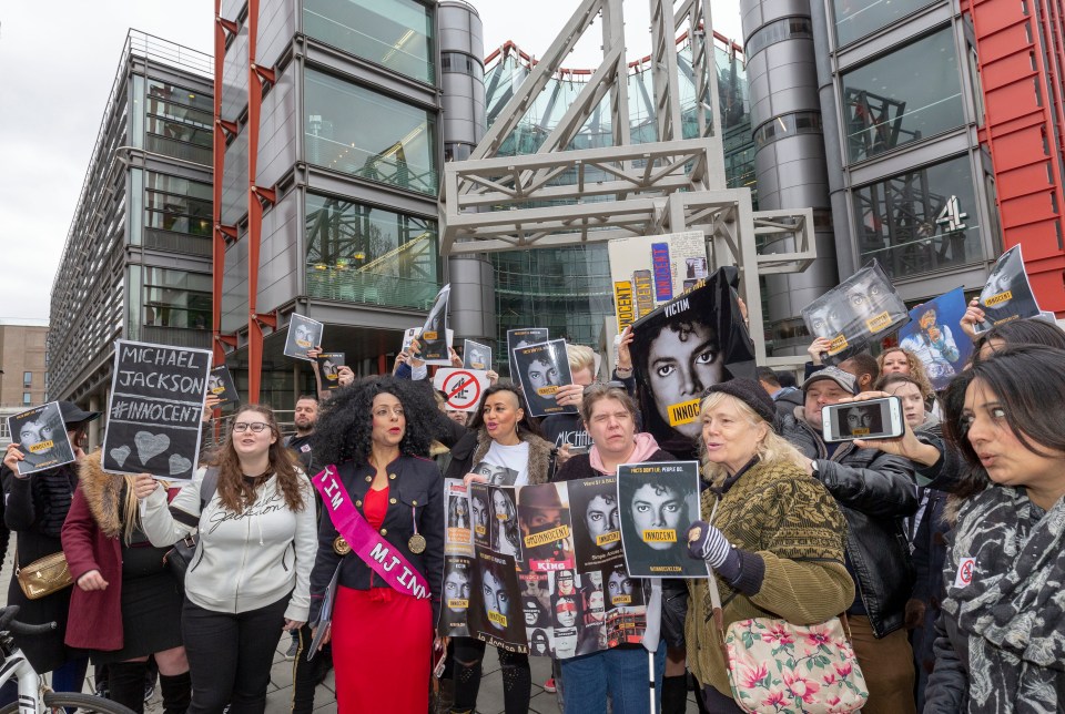  Jackson's fans holding pictures of their hero