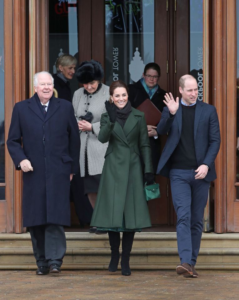 The couple waved happily at crowds