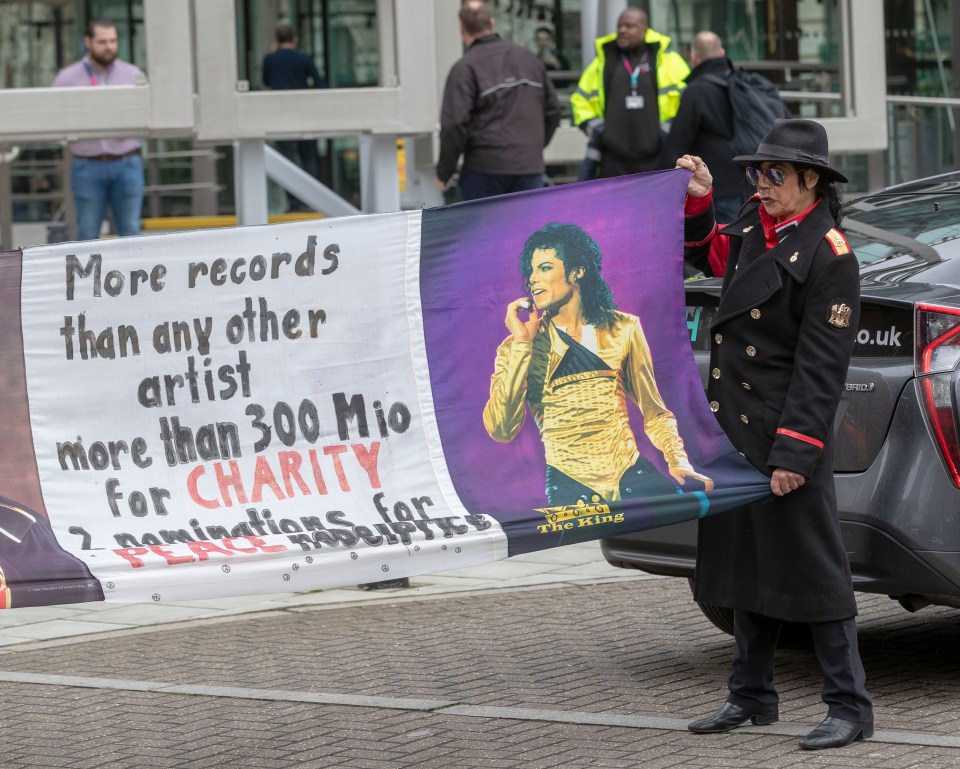  One banner highlights the work Jackson did for charity