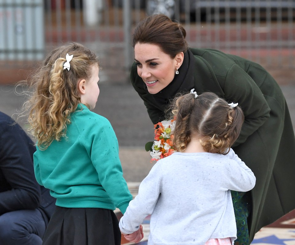 Kate, who met local children, said she hoped to return in sunnier conditions with her own kids