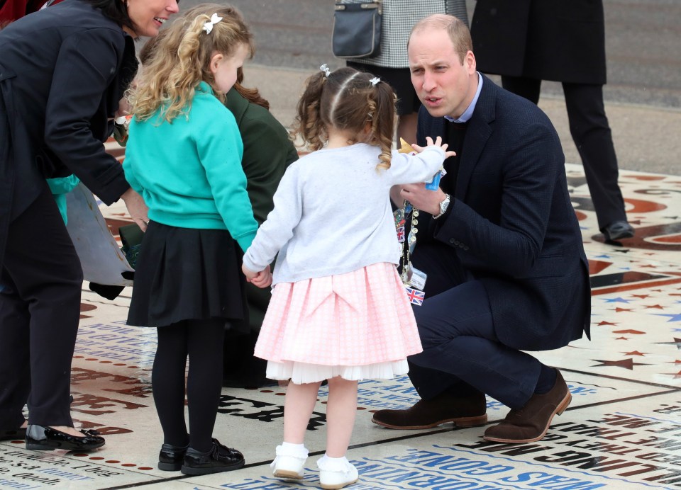 The future king thanks the local children