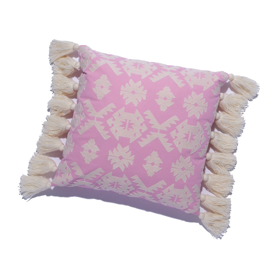 Show your sofa or bed some love by adding this cushion to it