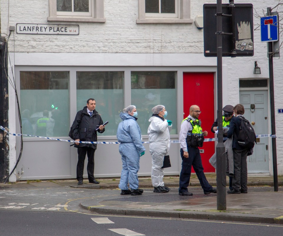  Forensic officers are on the scene in West Kensington after Ayub was stabbed to death