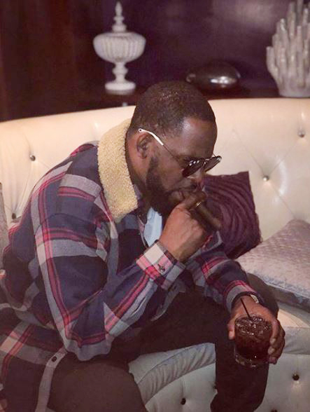  R Kelly has a drink inside his Chicago apartment