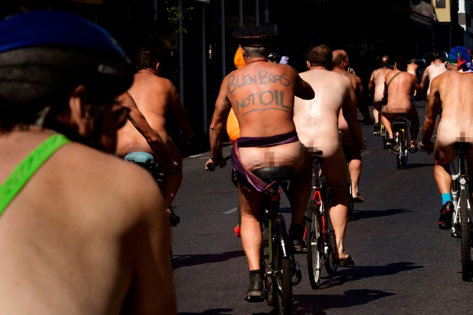 This man's back says 'Burn bras not oil'