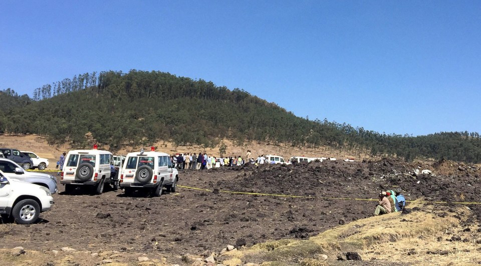 A huge number of cars and people rushed to the crash site after the doomed plane came down