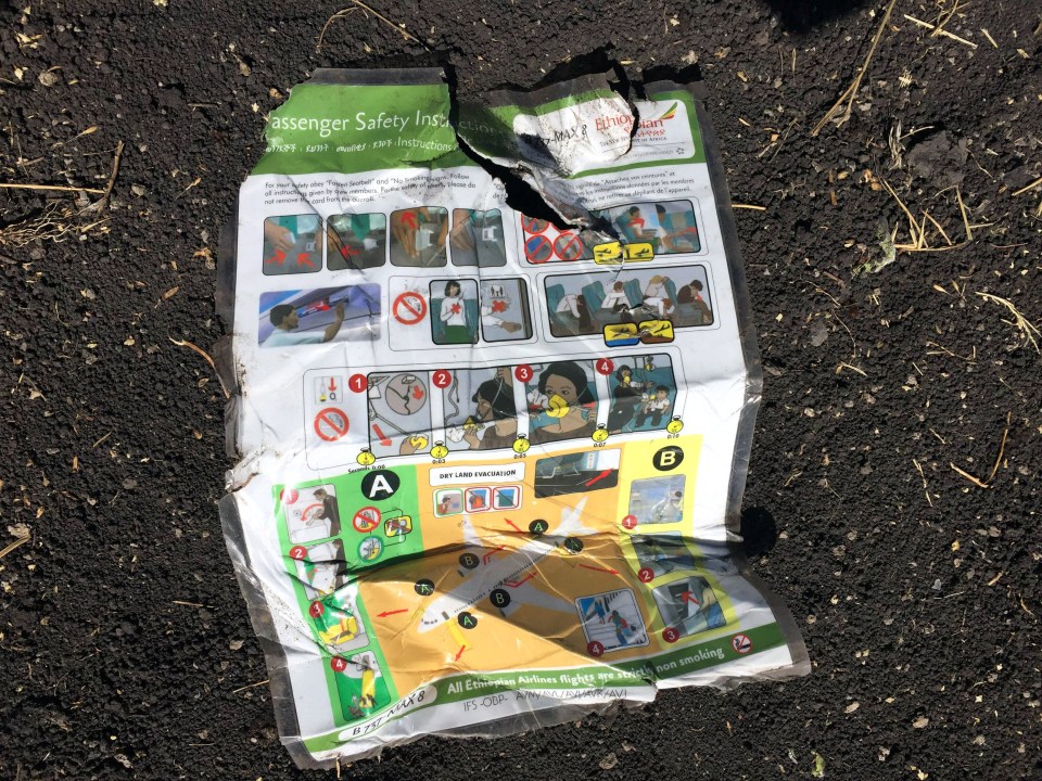 A safety card pictured after it landed on the ground near to the fatal crash site