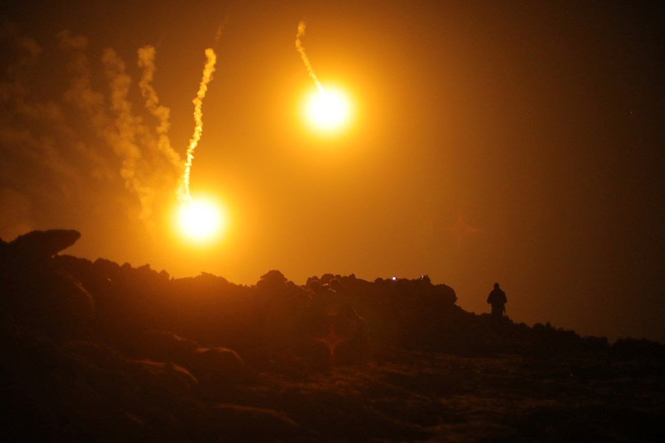 The town was pounded by rockets overnight prompting the surrender of thousands of fighters