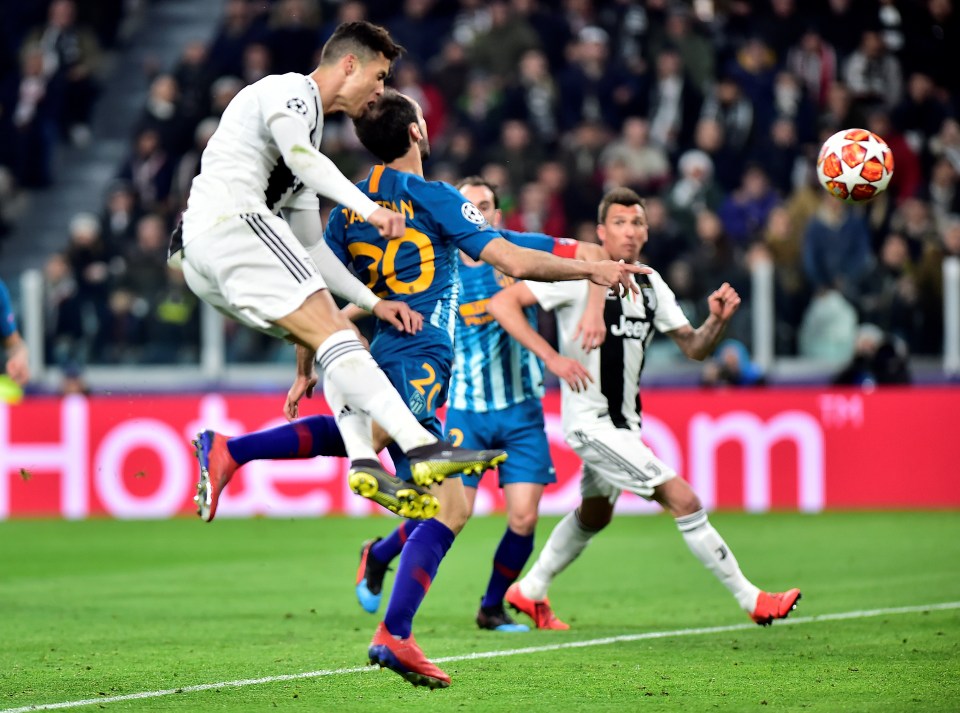  Ronaldo beats Atletico defender Juanfran to the ball and heads it home