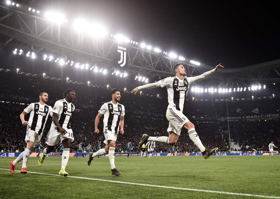  Juventus celebrate after Ronaldo scores from the spot, securing his hat-trick as well as sending the Italians into the Champions League quarter-finals