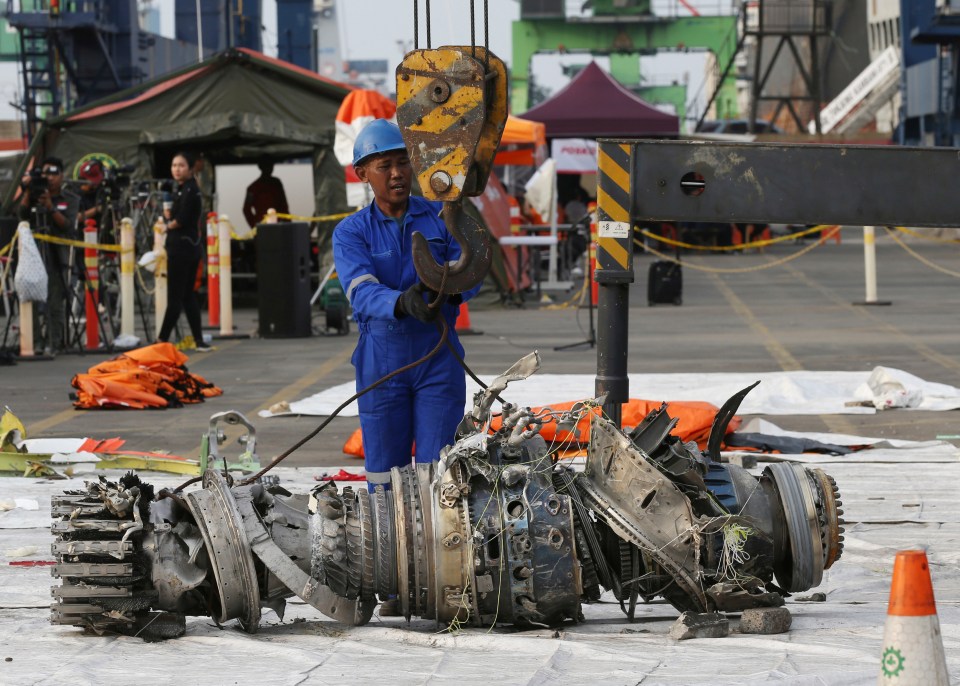 An engine is recovered from a Lion Air jet after it crashed in October