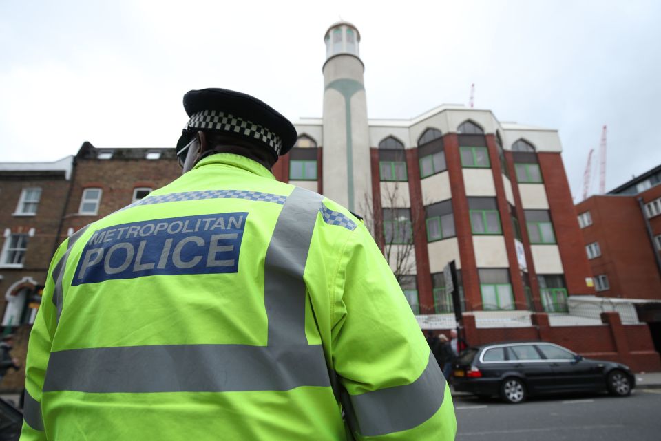  A police officer stands outside Finsbury Park Mosque in London ahead of Friday Prayers