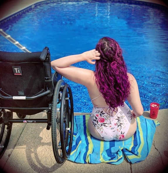  While some think of a wheelchair as a 'prison', she sees it as her 'ticket to freedom'