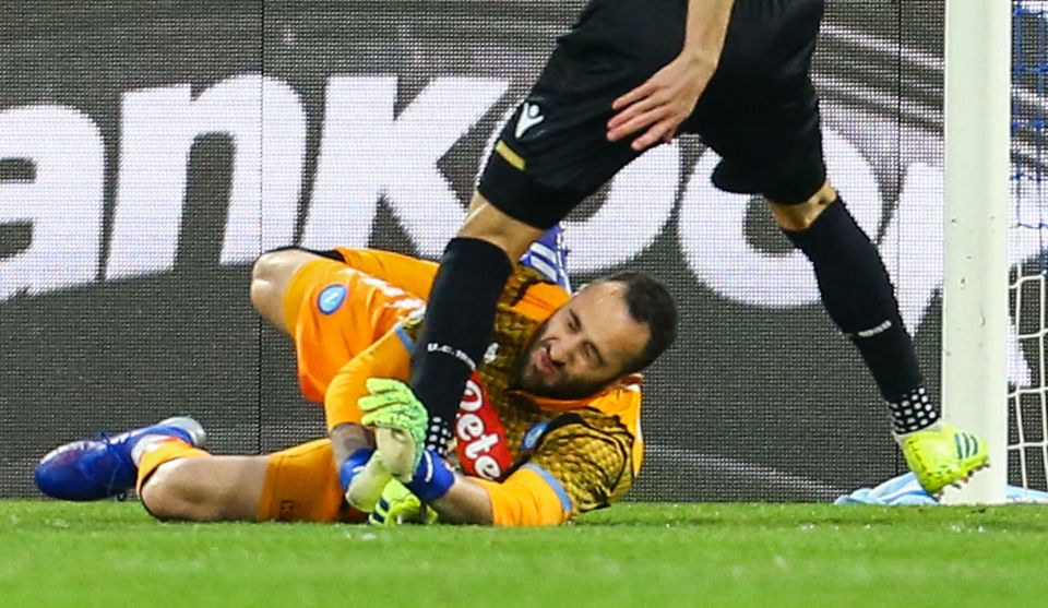  Ospina was clattered by Udinese forward Ignacio Pussetto during the Serie A clash