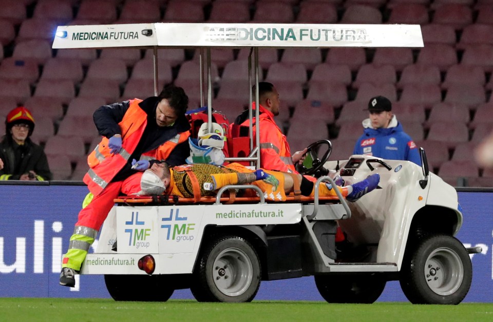 David Ospina is carried off the pitch and rushed to hospital