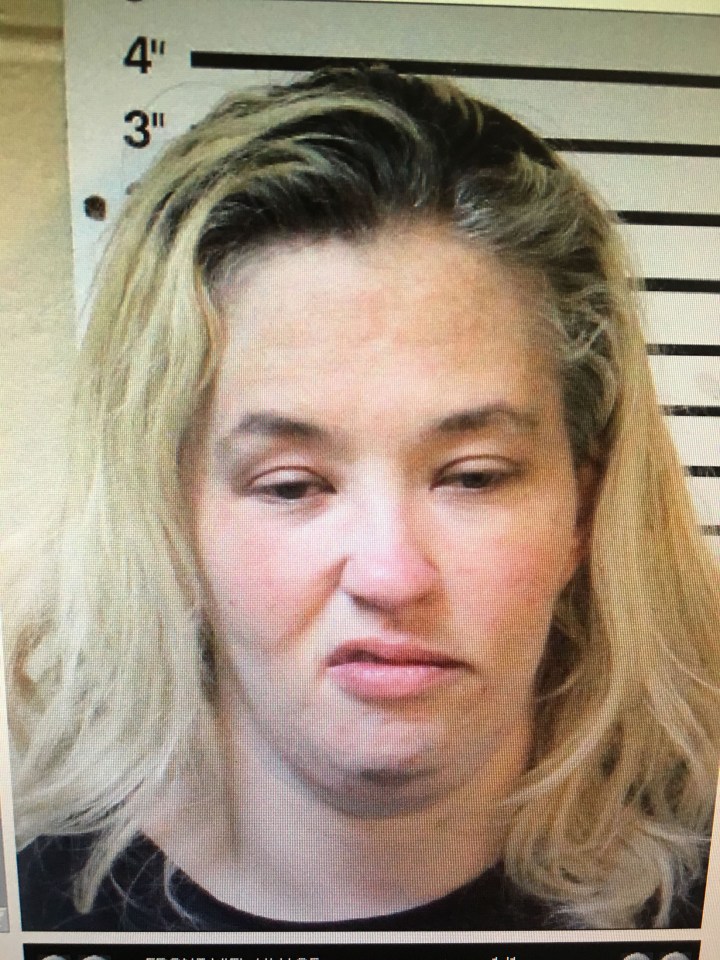  Mama June sneered in a police mugshot after she was charged with possession of crack cocaine