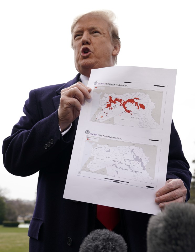 Donald Trump shows a map showing the final remaining pockets of ISIS resistance