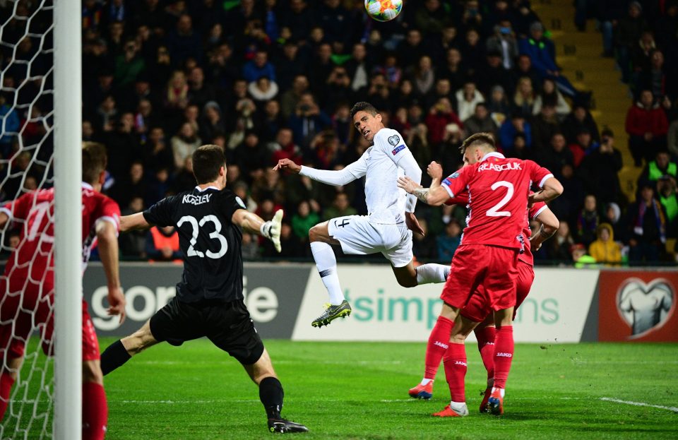  Raphael Varane doubled France's advantage when he flicked a header into the far corner