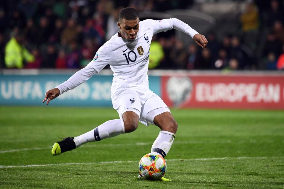  Kylian Mbappe curled into the corner late on to add France's fourth