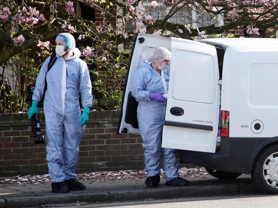  Forensics at the scene as investigators look into a 'violent robbery' that escalated