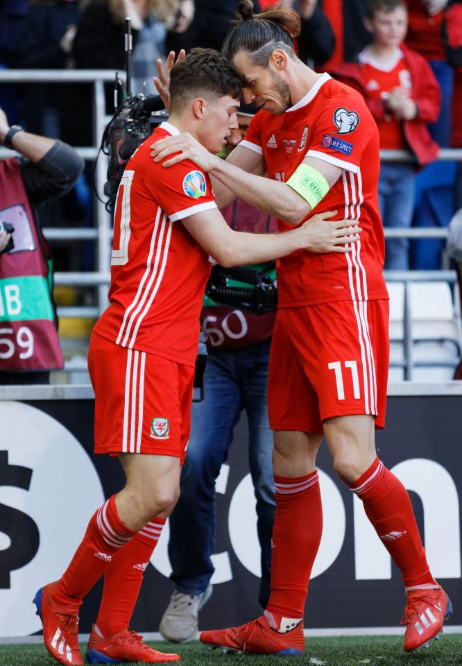  The Swansea winger is congratulated by Gareth Bale for his super strike