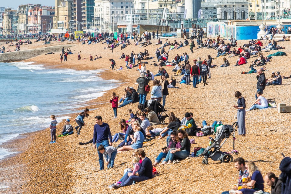  People enjoyed the warm weather on Sunday (pictured is Brighton Beach)