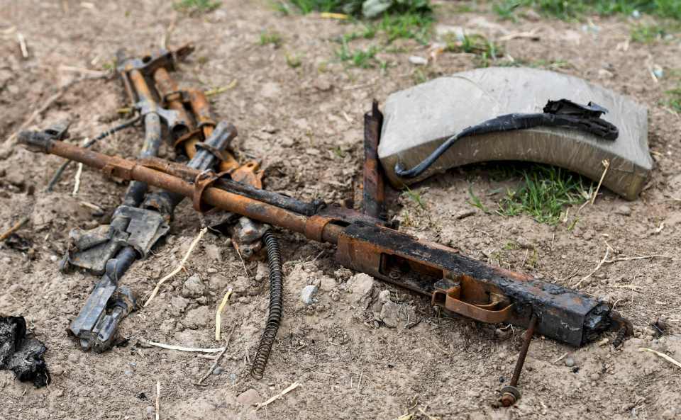  Weapons discarded by the fleeing jihadis lie strewn across the battlefield