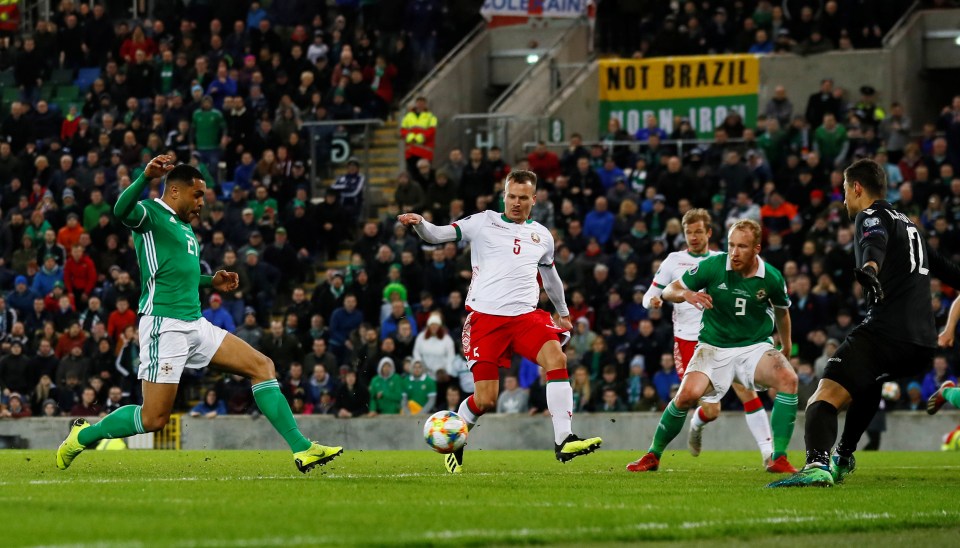 Northern Ireland striker Josh Magennis netted a dramatic winner at Windsor Park against Belarus