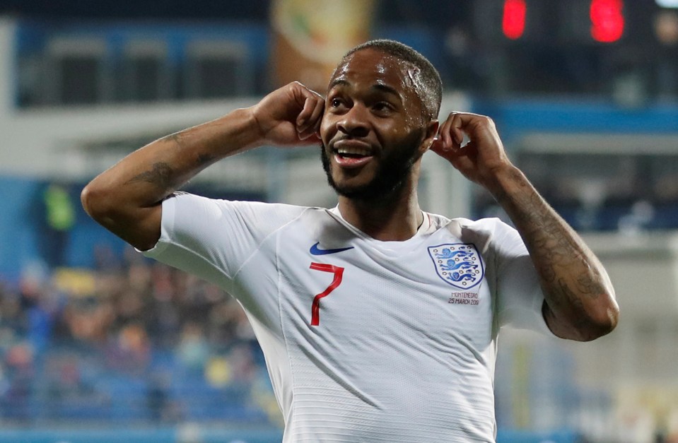 Raheem Sterling celebrates after scoring the fifth late on, his fourth goal in his last two England matches