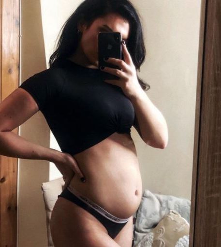 Alexandra shared this snap of her bloated stomach