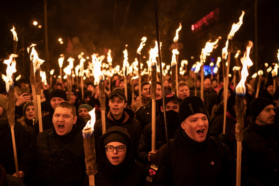 Nationalist carry torches to mark the birthday of Stepan Bandera, the founder of the rebel army that fought against the Soviet regime