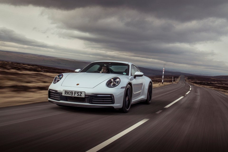  The Porsche 911 is the ultimate sports car mixing beautiful engineering and heroic speed