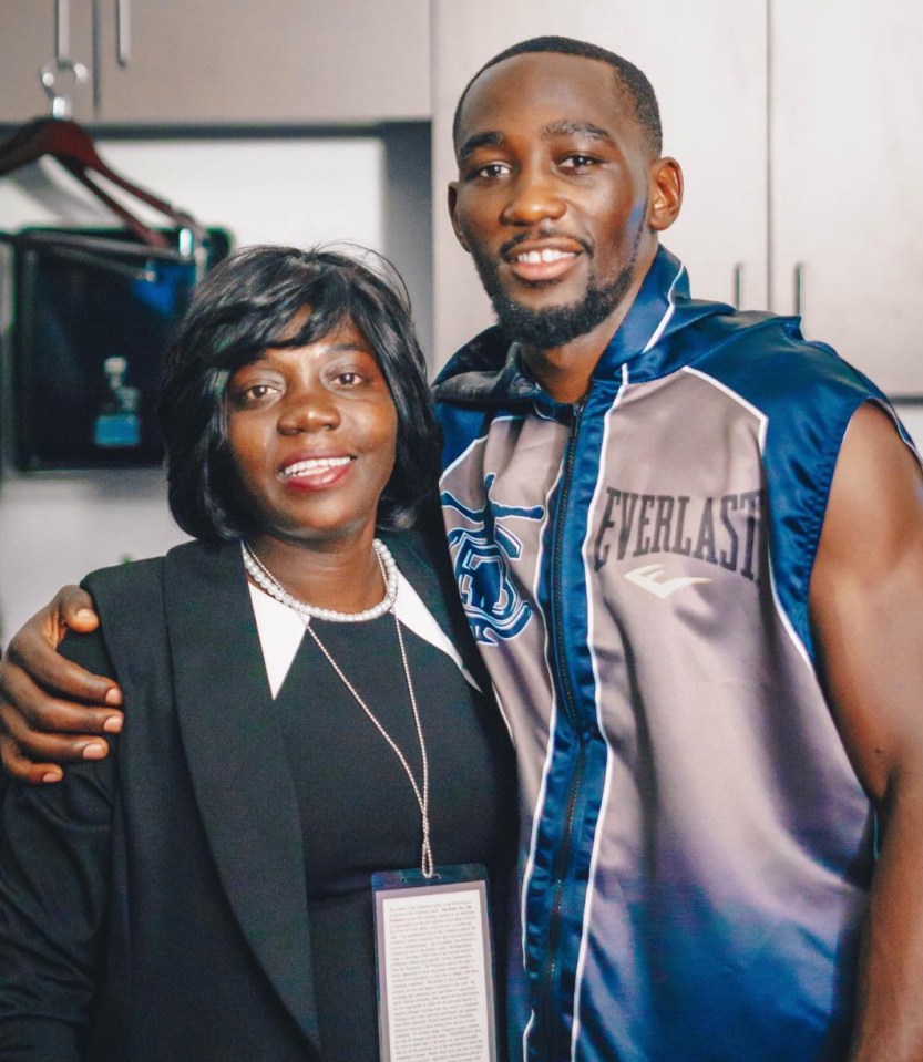 Crawford with his mum Debbie who hit him with a belt as a kid