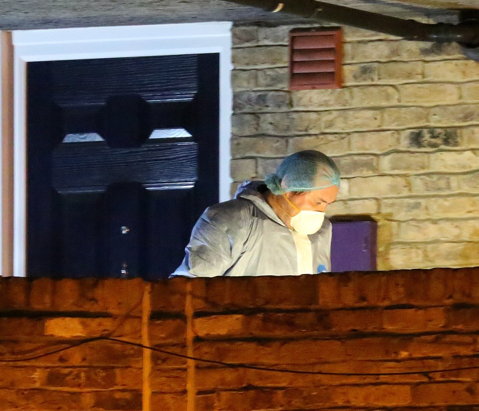  A forensic investigator at the flat where the victim was shot dead