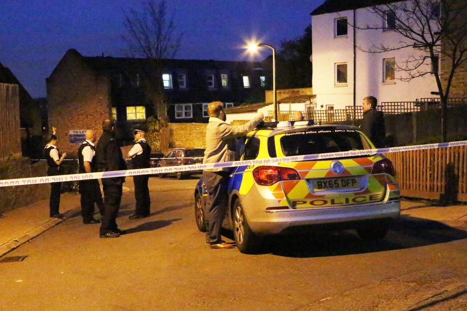  Police at the scene of the murder on Wednesday afternoon in South London where a young man was shot dead