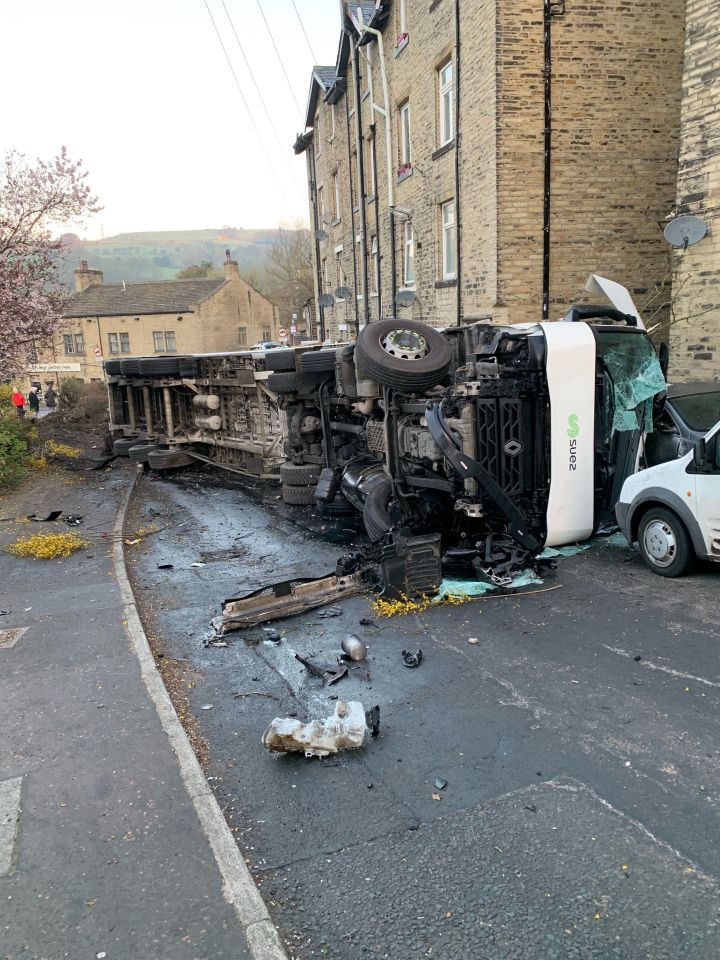  The refuse lorry smashed into a house on Stump Cross in Halifax this morning