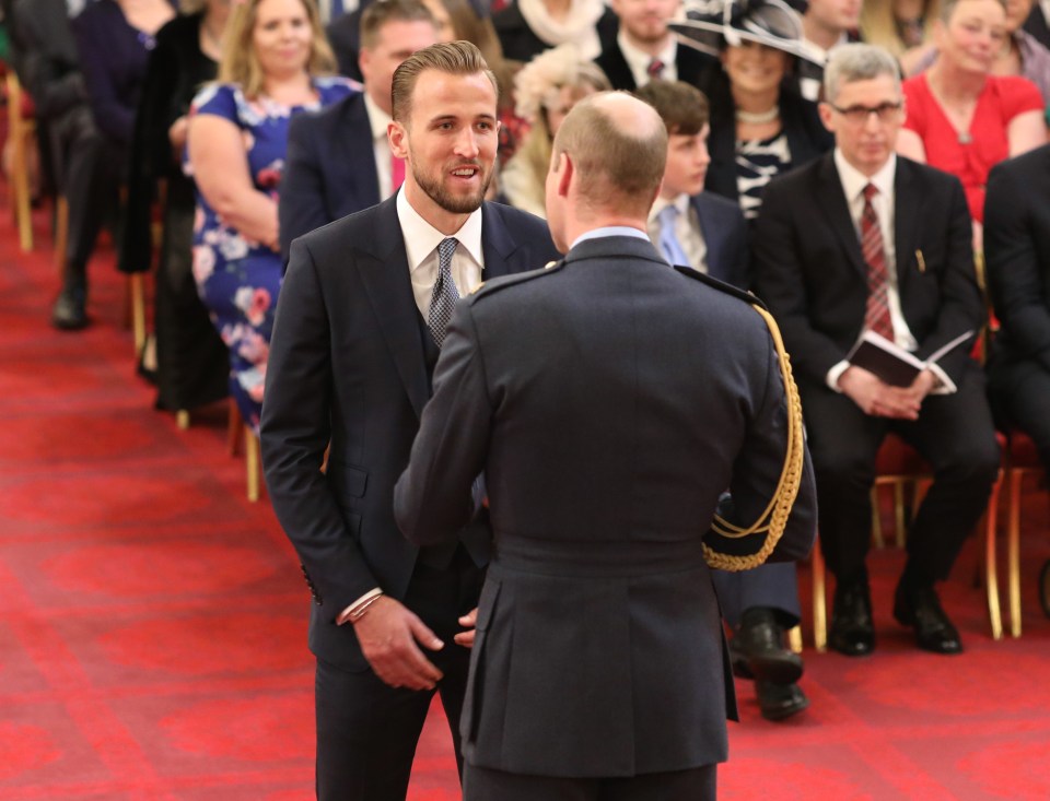 Prince William pinned the honour to the England man's suit at Buckingham Palace