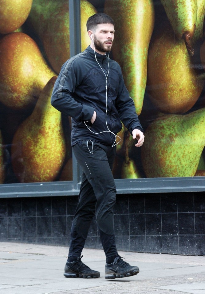  Sam strolled along wearing all black