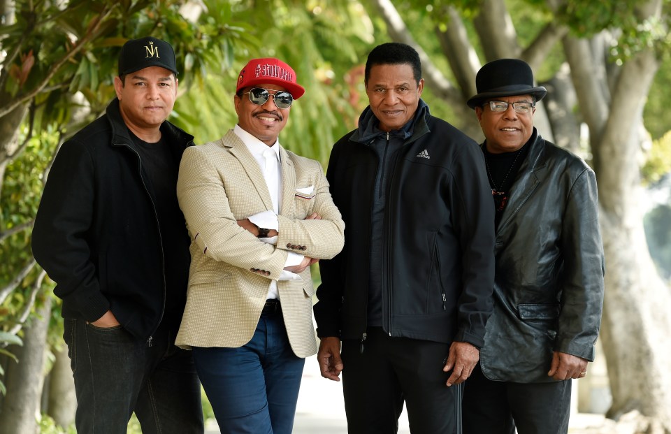 The Jackson family - nephew Taj, and brothers Marlon, Jackie and Tito of the Jackson 5