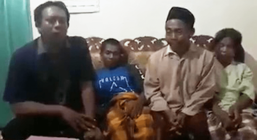 Nedi Sito (second from right), 55, from the village of Maron Kidul in the Maron District of Indonesia's East Java province, reported his son-in-law to police for having 'large genitals'