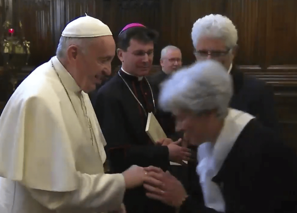  One woman goes to kiss Pope Francis's hand