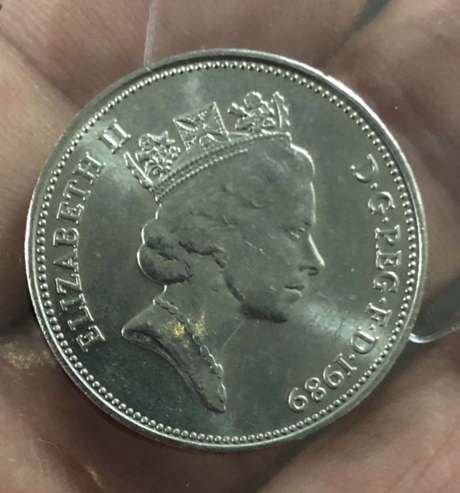  The coin was made by mistake and accidentally minted on a silver coloured base