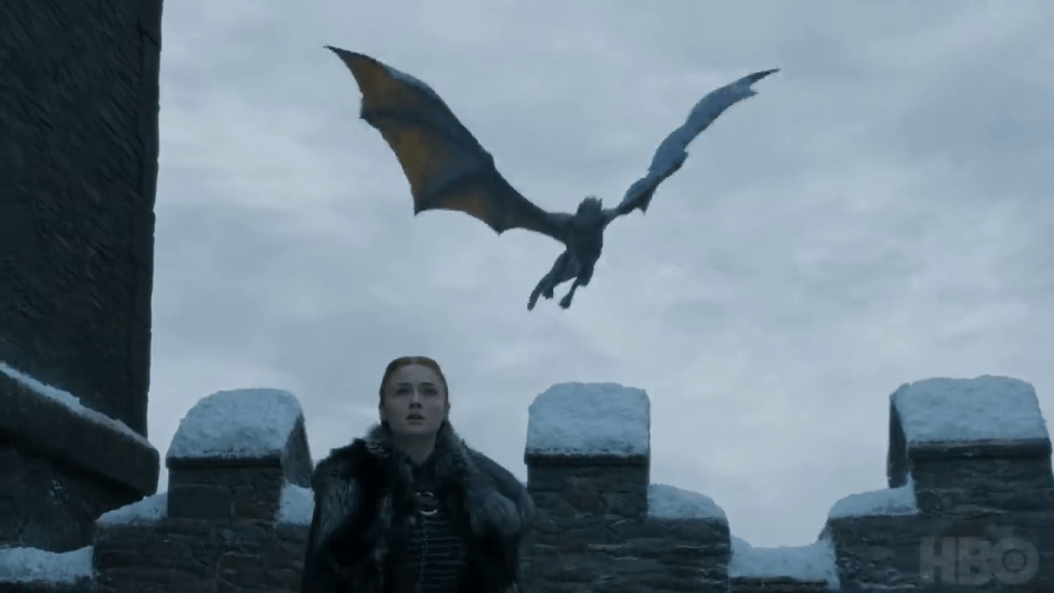  Sansa looks in wonder at Daenerys' dragons