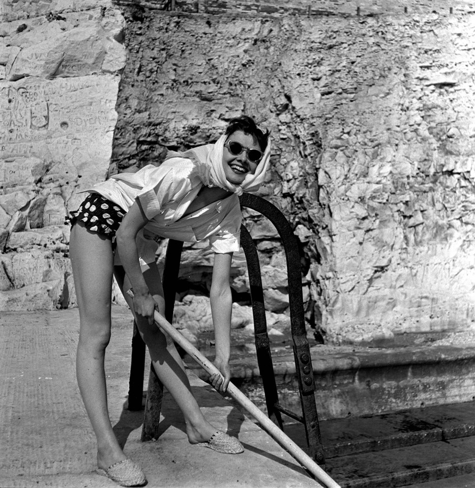 Audrey Hepburn pictured relaxing during a break in filming in Sussex