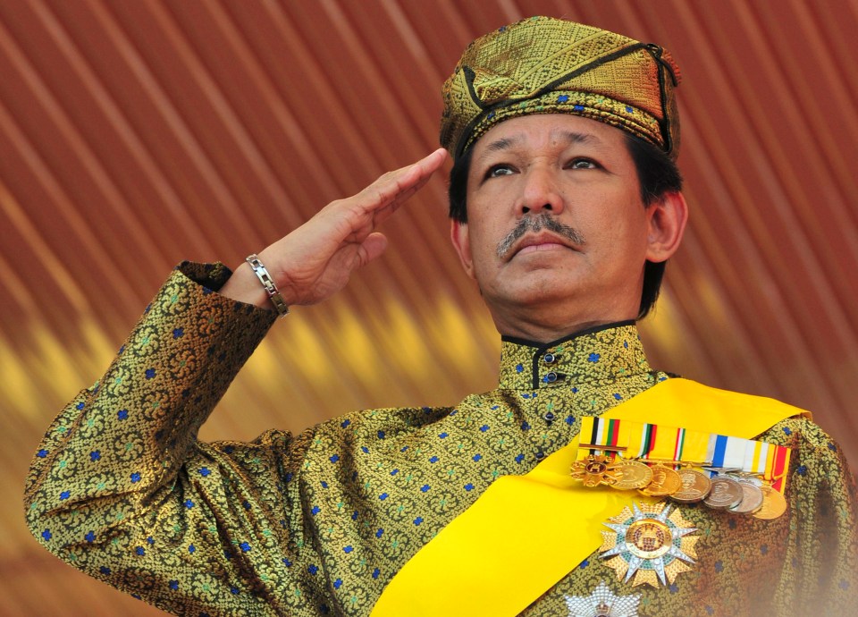  Prince Jefri salutes during his brother Sultan Hassanal Bolkiah's 64th birthday celebrations